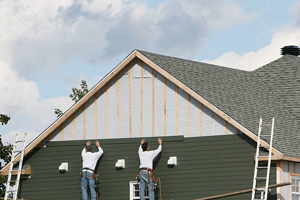 Professional Siding Contractor technician working in Hampton, VA